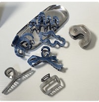 a group of blue metal tools on a table
